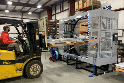 TAB Wrapper Tornado orbital wrapper at Penn Sheet Metal wrapping long load Forklift using TAB Wrapper Tornado orbital wrapper at Penn Sheet Metal