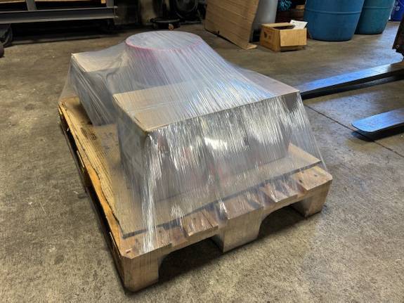 Mixed palletized load of cartons stretch wrapped with TAB Wrapper Tornado orbital wrapping machine